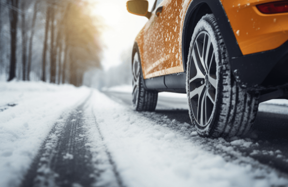 Car driving on black ice